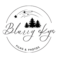 The logo of Blurry Skys Films and Photos Company