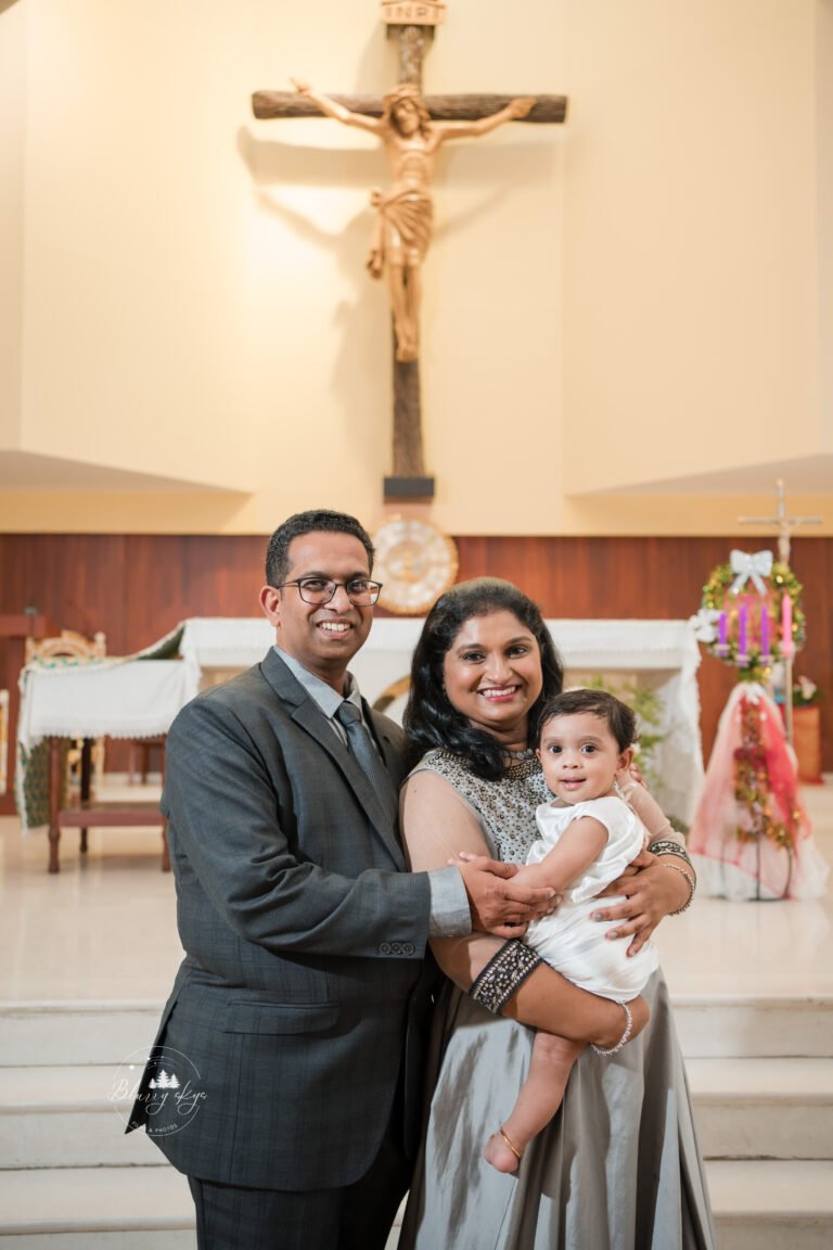 Kerala Malayali couple during their child's baptism ceremony.