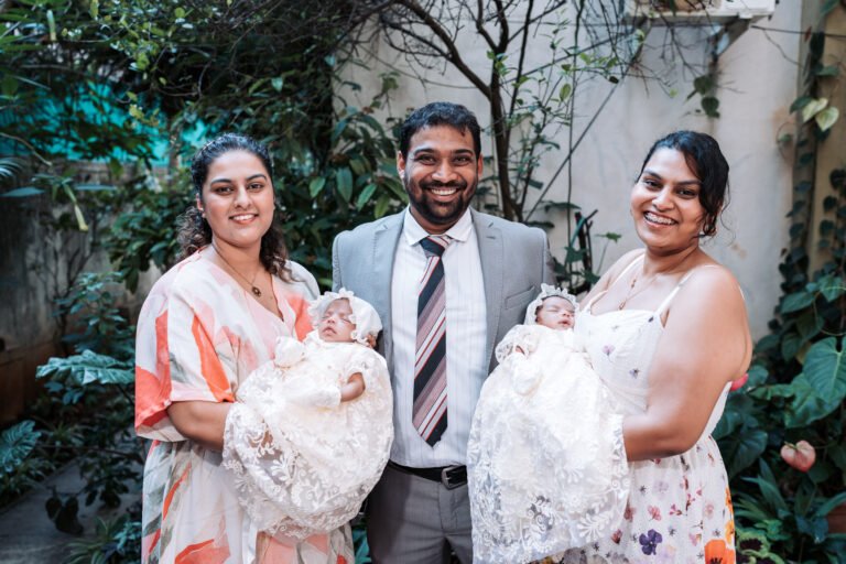 Uncle and aunt posing with their nephews during a family photo session