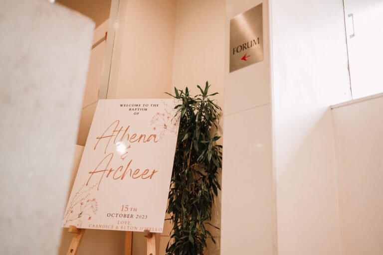 A welcome board at a baptism reception ceremony