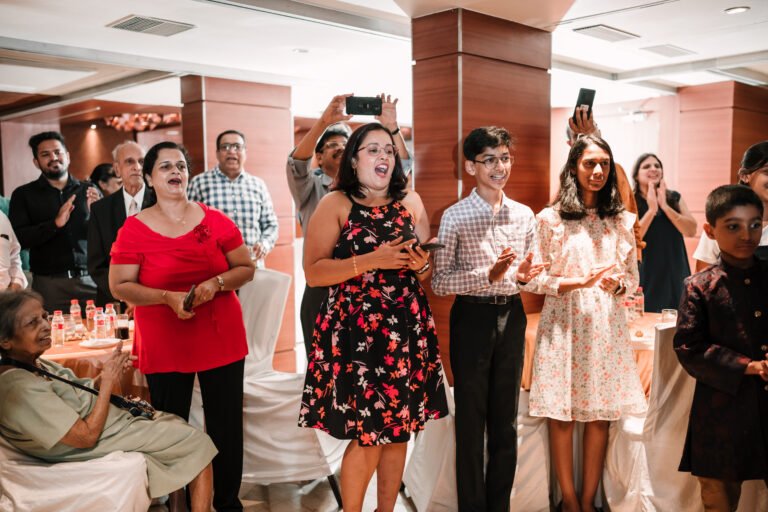 Active and cheerful audience during the reception, enjoying the festive atmosphere and celebrations.